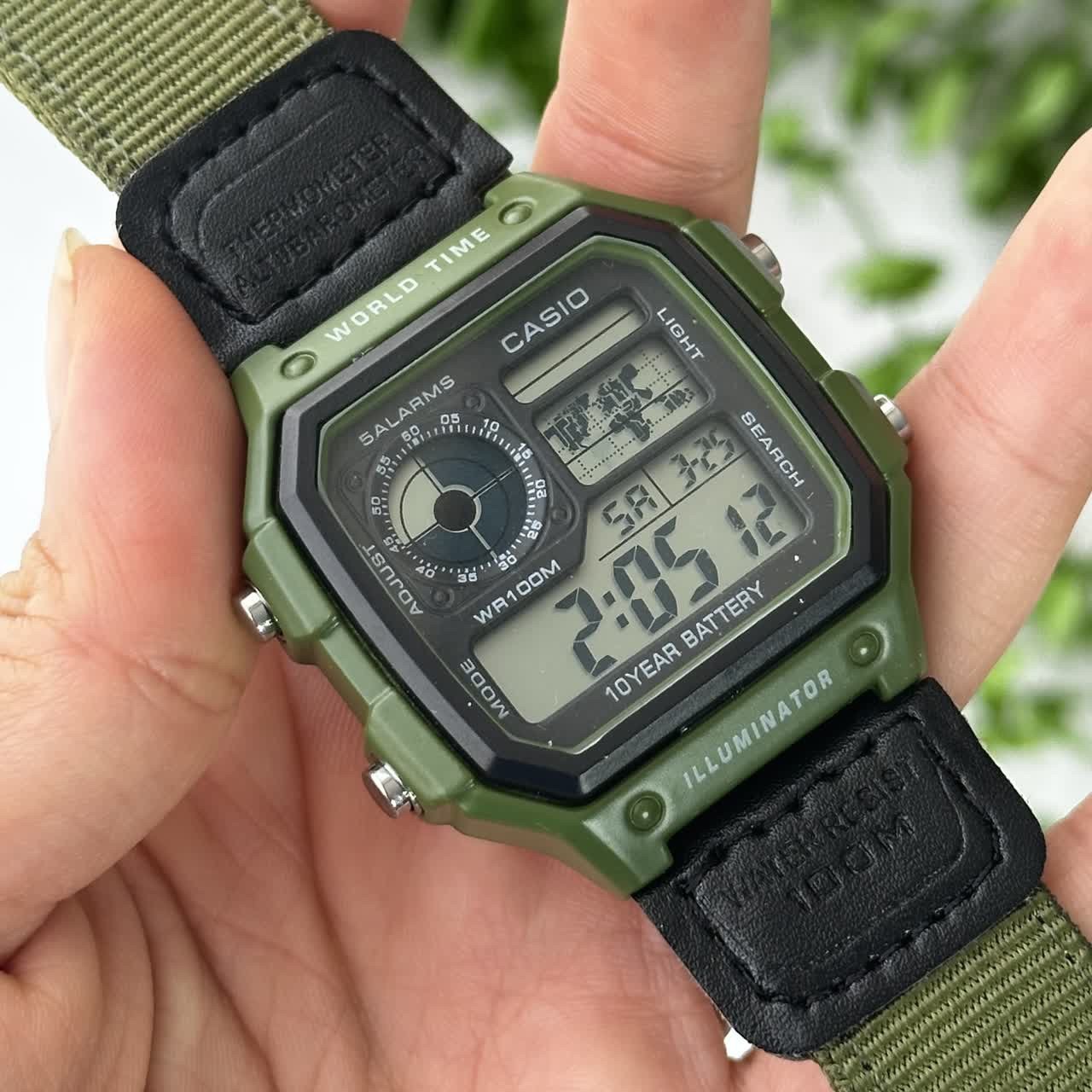 ساعت مچی مردانه کاسیو جهان نما بند برزنتی سبز casio