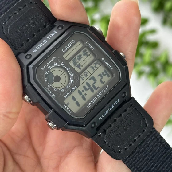 ساعت مچی مردانه کاسیو جهان نما بند برزنتی مشکی casio