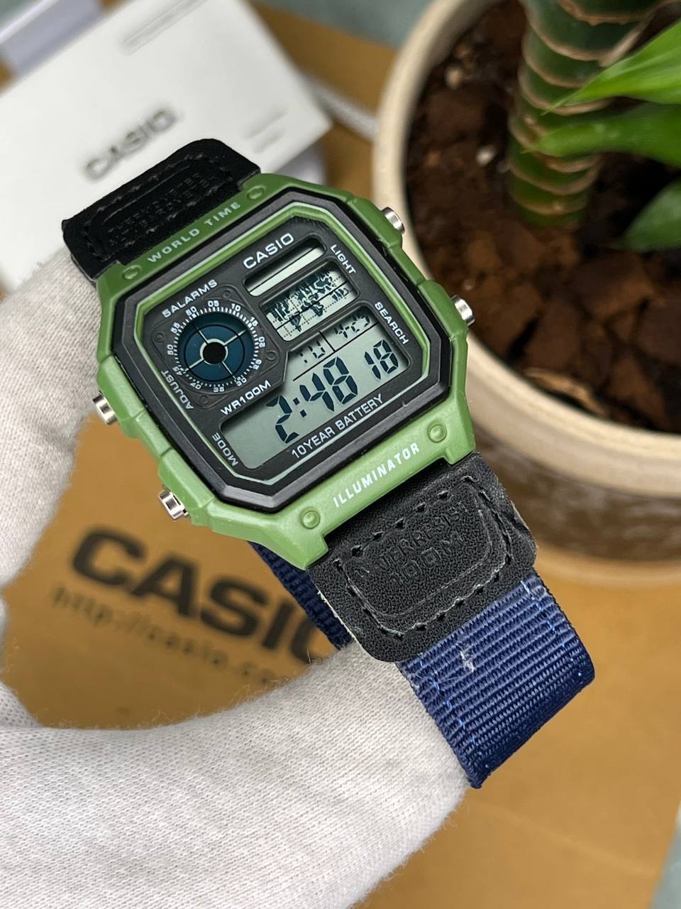 ساعت مچی مردانه کاسیو جهان نما بند برزنتی سرمه ای casio