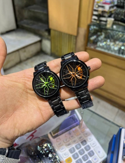 ساعت رینگی فلزی چرخشی